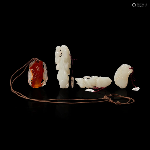 A group of three Chinese white jade carvings and a carnelian...
