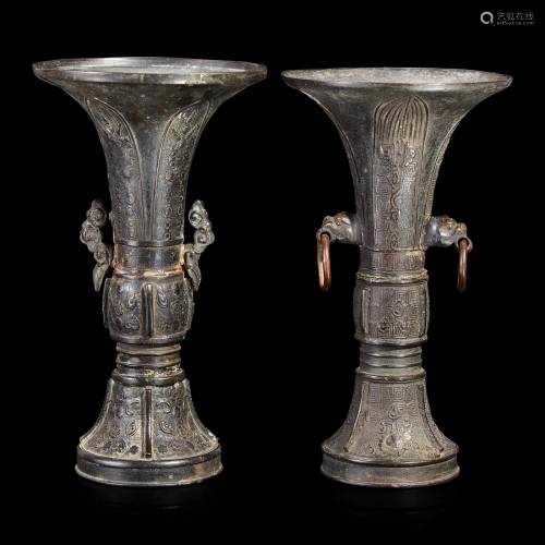 Two patinated bronze archaistic gu-form vases 18th/19th cent...