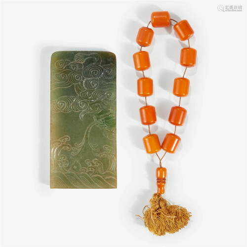 A Chinese carved jadeite "Dragon" plaque and a par...