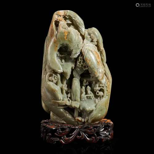 A Large Chinese carved celadon and russet jade mountain and ...