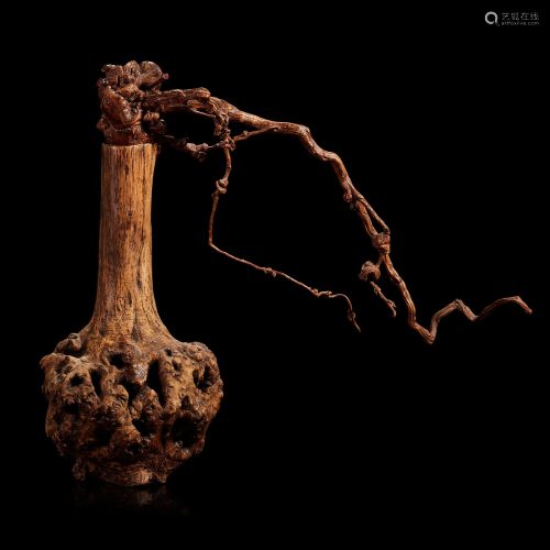 A Burl Wood Vase of "Flowers"