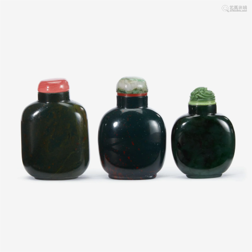 Three Chinese green hardstone snuff bottles