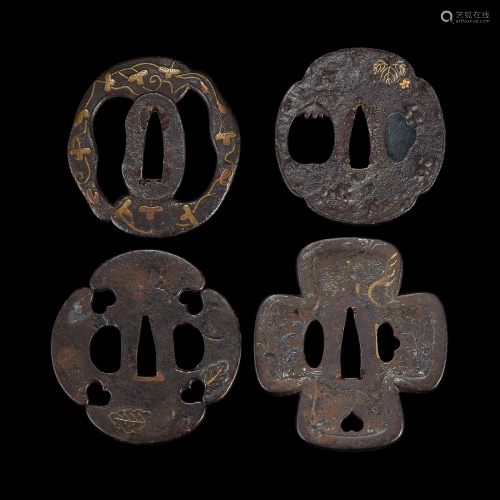 Group of eight Japanese inlaid iron tsuba Edo period or earl...