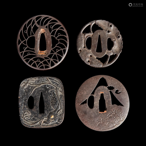 Group of four Japanese iron tsuba