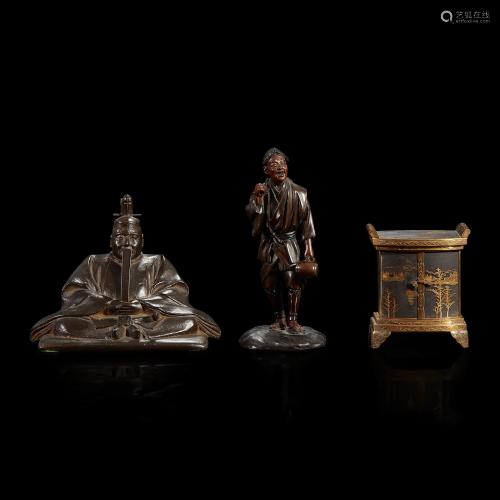 Two small Japanese patinated figures and a parcel-gilt metal...