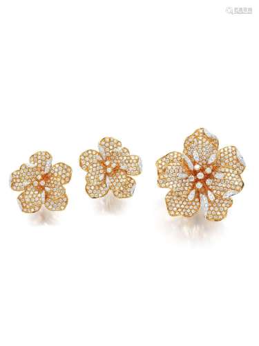 A COLOURED DIAMOND AND DIAMOND 'FLOWER' RING AND EARCLIP SET...