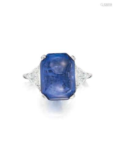 A CABOCHON SAPPHIRE AND DIAMOND RING