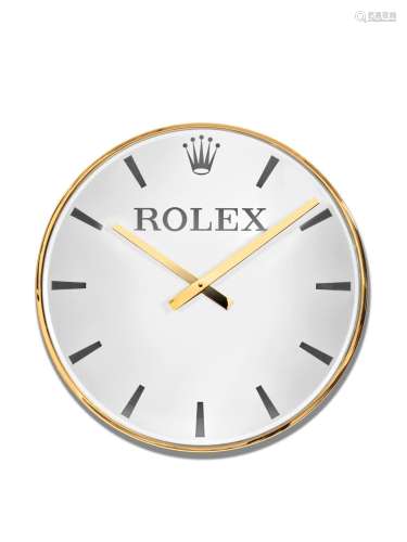 ROLEX  A LARGE GILT BRASS WALL CLOCK, CIRCA 1960