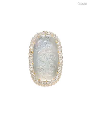 A CARVED MOONSTONE AND DIAMOND BROOCH