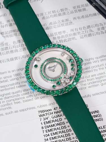CHOPARD  HAPPY DIAMONDS, A NEW STOCK WHITE GOLD, EMERALD AND...