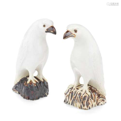 A very rare pair of Staffordshire saltglaze models of Hawks,...