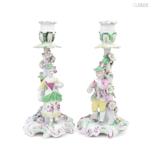A pair of Derby 'Pale Family' candlestick figures, circa 175...