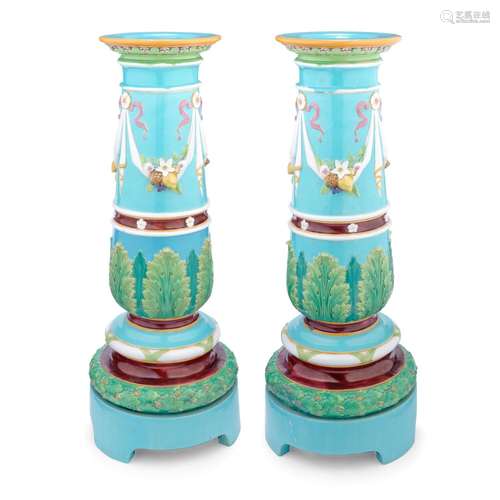 An impressive pair of Minton Majolica pedestals, dated 1871