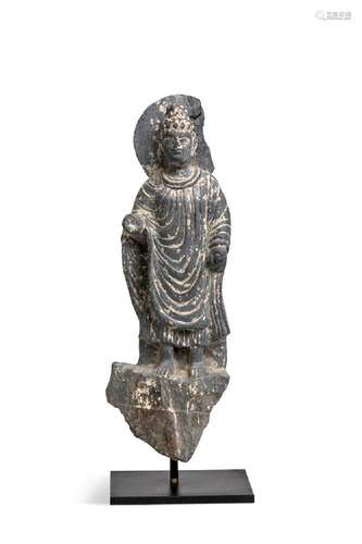 A Gandharan grey schist figure of a standing Buddha, 2nd/3rd...