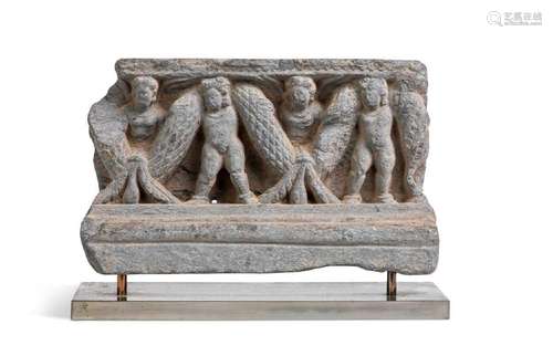 A Gandharan grey schist garlanded putti stair riser, 1st-3rd...