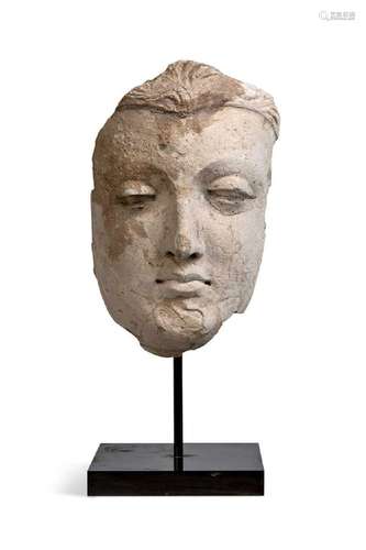 A Gandharan stucco fragmentary face of Buddha, North West In...