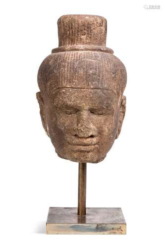 A Khmer red sandstone head of Shiva, Baphuon style, perhaps ...