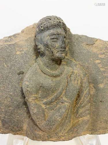 A Gandharan grey schist panel with a Buddhist devotee, 2nd/3...