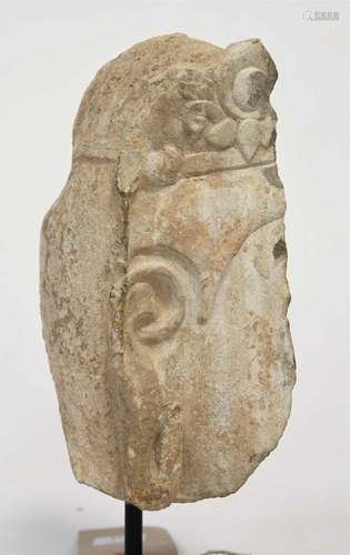 A Chinese stone fragmentary head of a Buddhist deity, Tang s...