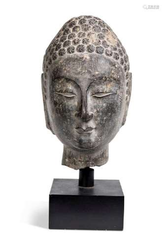A Northern Qi -Sui Dynasty style black stone Buddha head,