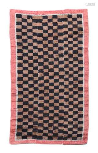 An early Tibetan Tsukdruk chequerboard woven in three panels...