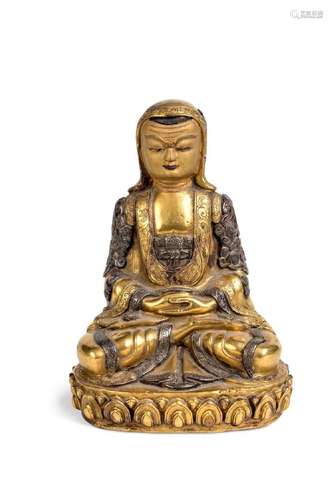 A Tibetan gilt bronze seated figure of a lama, early/mid 20t...