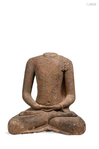 A South East Asian, volcanic tufa stone torso of a monk, Can...