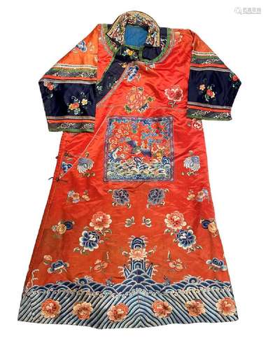 A Chinese embroidered red silk robe, late Qing Dynasty, circ...