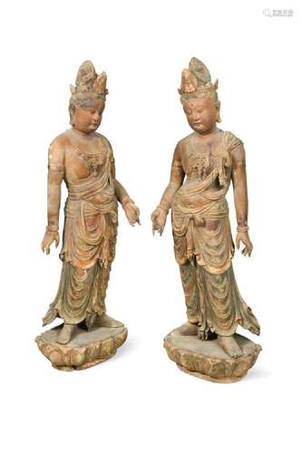 A large pair of Chinese carved wood and polychrome lacquered...