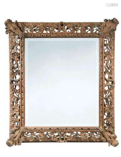 A carved wood wall mirror, 19th century,