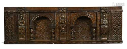 An Elizabethan oak overmantel.