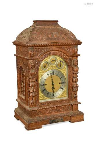 A Victorian carved oak chiming table clock, dated 1888,