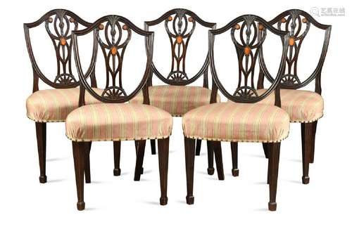 A set of five George III Hepplewhite style mahogany dining c...