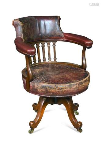 A late Victorian mahogany swivel desk chair,