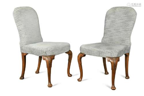 A pair of George II style walnut dining chairs, 20th century...