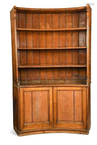 A blonde oak curved dresser, circa 1900,