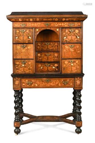 A Dutch walnut and ebonised marquetry cabinet on stand, late...