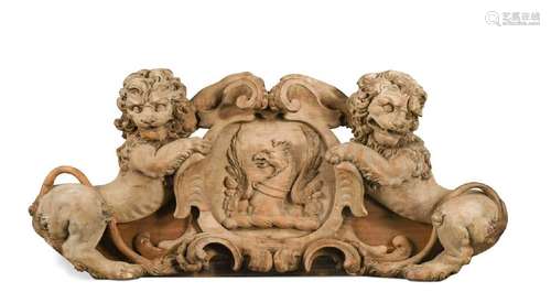 A carved limewood crest, 18th century,