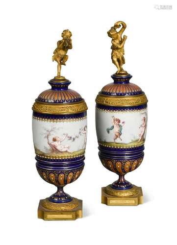 A pair of Sèvres porcelain and ormolu mounted vases and cove...