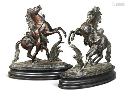 After Guillaume Coustou (1677-1746), a large pair of bronze ...