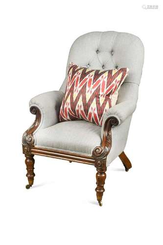 A William IV mahogany button back armchair,