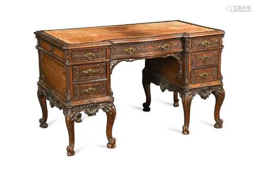 A Chippendale style carved mahogany pedestal desk, late 19th...