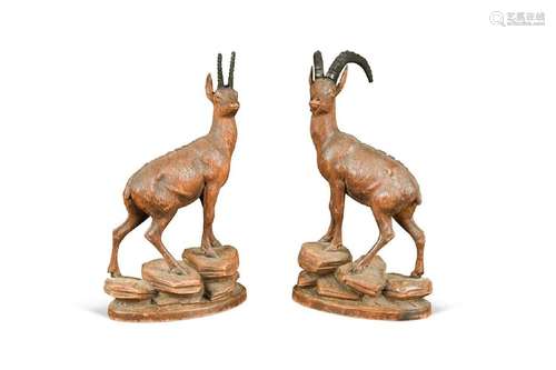 A pair of Black Forest carved Alpine ibex, early 20th centur...