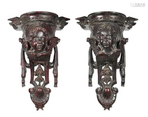 A pair of 17th century style carved and stained wall bracket...