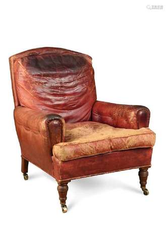 A late Victorian walnut leather armchair,