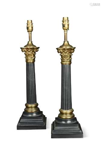 A pair of cast metal Corinthian column table lamps, 20th cen...