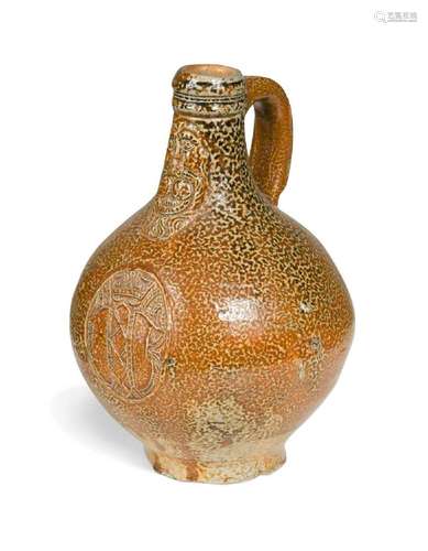 A German stoneware armorial Bartmann jug or Bellarmine, 17th...