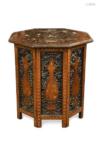 A Moorish style brass inlaid hardwood occasional table, 20th...