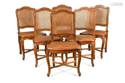 A set of six Louis XV caned side chairs,