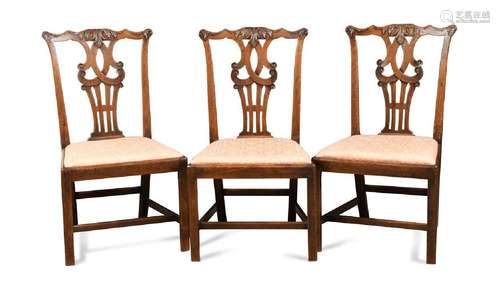 A set of three fruitwood dining chairs, 18th century,